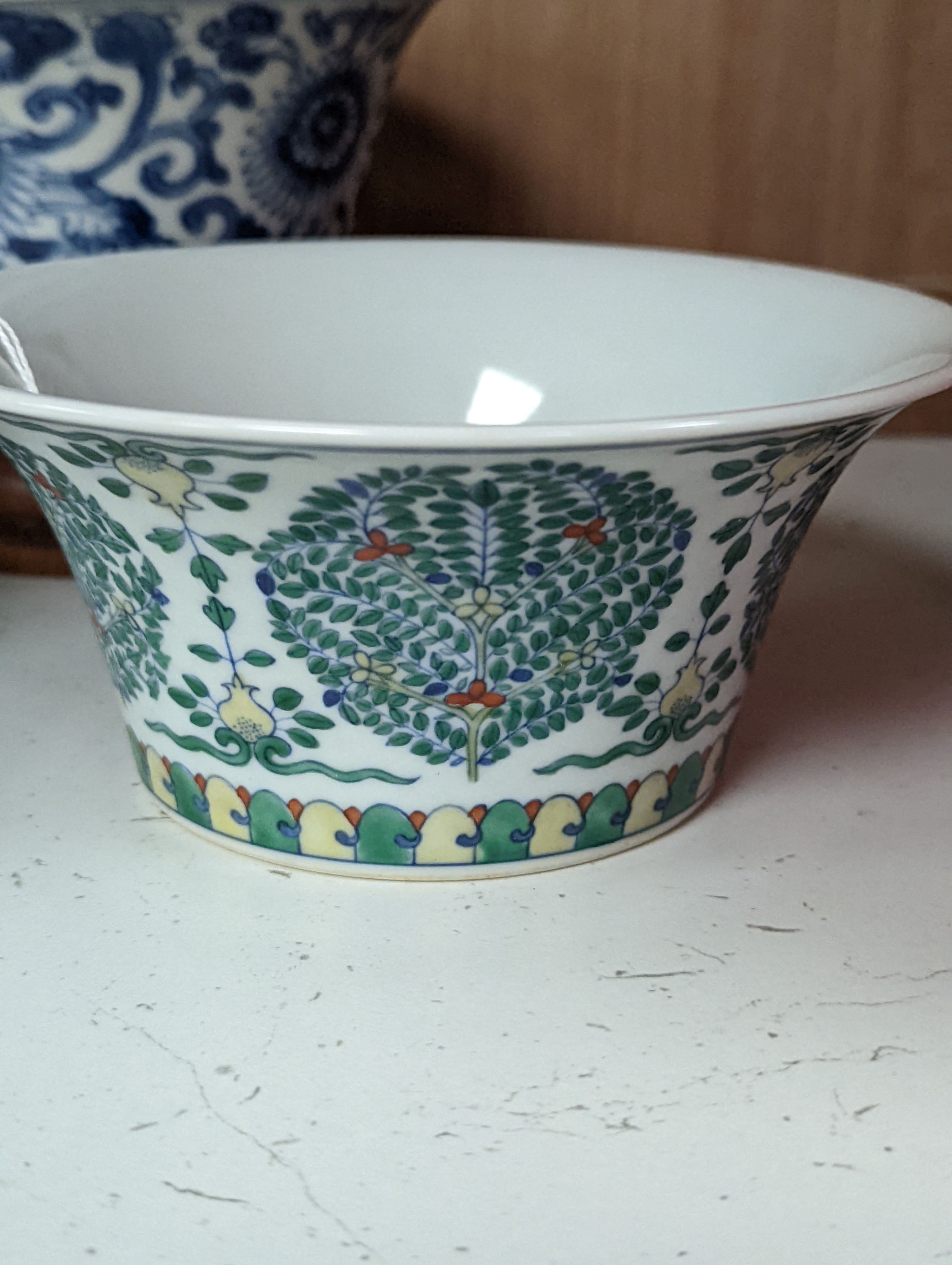 A Chinese blue and white bowl, Kangxi, 15cm. diam., a famille rose teapot stand, Yongzheng, and two doucai bowls
